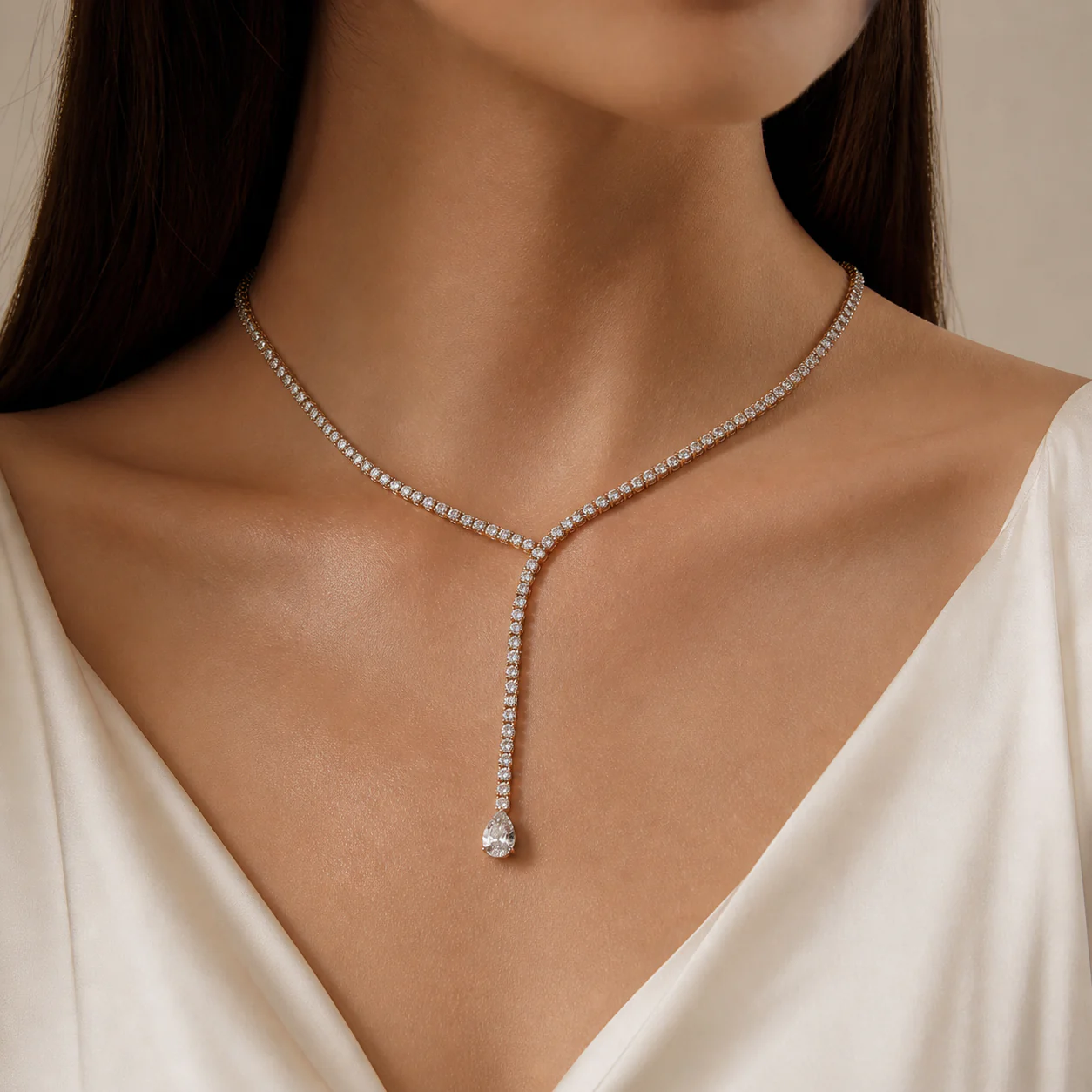 Diamond necklace with a delicate drop detail following the neckline